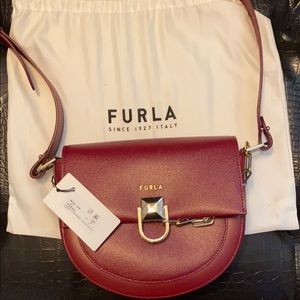Woman’s Furla hand bag